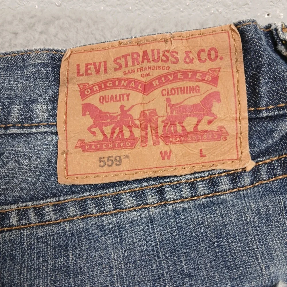 Levi's 559 Relaxed Straight Jeans Mens‎ 52x32 Medium Wash Blue Range EUC